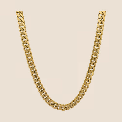 9MM Cuban link chain in 14k solid yellow gold with box lock, hand-forged and made in USA, showcasing a standout interlocking design.